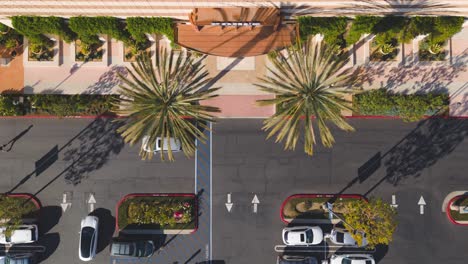 top-down-aerial-time-lapse-shows-customers-parking-and-shopping-at-Kohl's-and-REI-on-a-sunny-SoCal-day