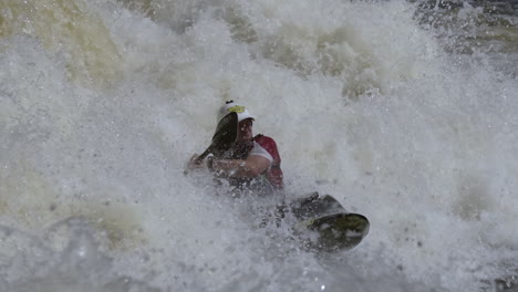 Kayak-on-white-water-close-up-splashing-paddling