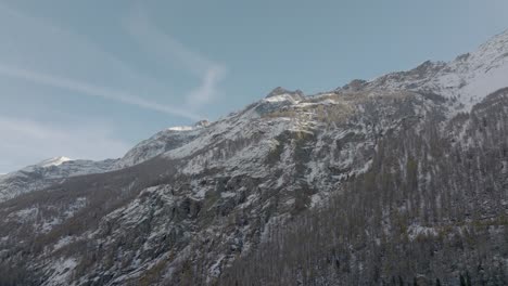 Sideways-aerial-drone-video-of-mountain-top-tilted-upwards