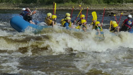 White-water-rafting-on-the-ottawa-river-during-peak-tourism-season---big-group-of-friends