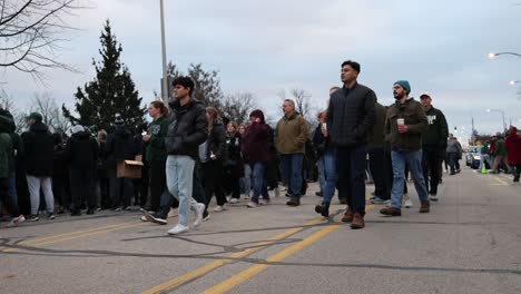 Michigan-State-University-Vigil-people-walking-in
