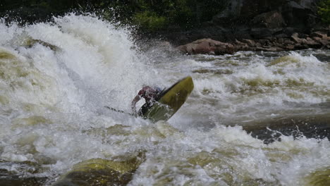 Extreme-sports-flip-kayak-white-water-waves