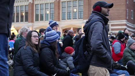 Mass-Shooting-Michigan-State-University-Vigil-People-sitting