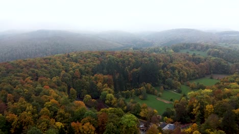 Aerial-shot-in-Germany-forest-and-mountains-during-autumn