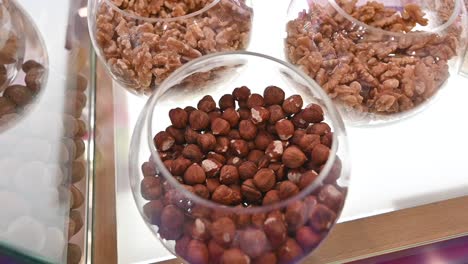 Closeup-of-Walnuts-and-Hazelnuts-are-displayed-during-the-Gulf-Food-exhibition,-United-Arab-Emirates