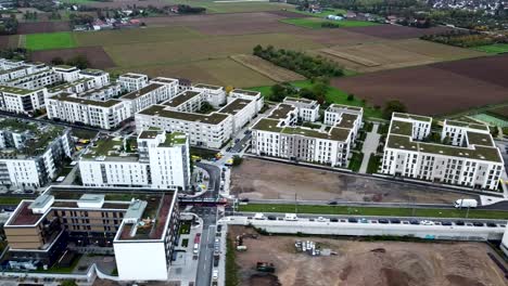 Great-aerial-shot-of-a-train-arriving-into-the-town-of-Ulm,-Germany