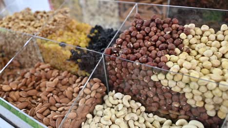 Dry-fruit-and-nuts-are-displayed-during-the-Gulf-Food-exhibition,-United-Arab-Emirates