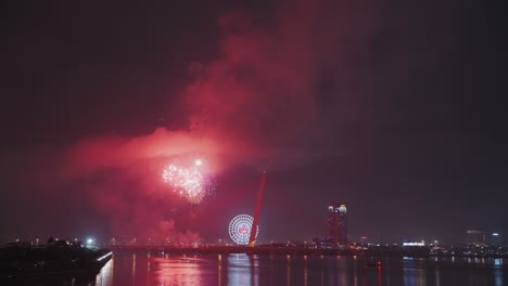 Colorful-fireworks-light-up-sky-for-Lunar-New-Year-and-Tet-holiday-over-the-Han-River-in-Danang,-Vietnam