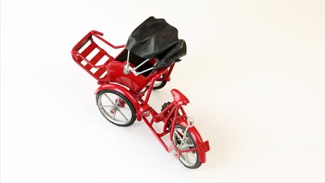 Tricycle-on-white-background-video
