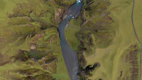 Top-down-aerial-view-of-Fjadrargljufur-canyon-in-Iceland