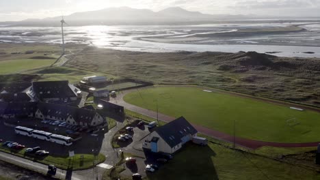Drone-shot-of-the-land-and-seascape-around-Benbecula,-particularly-the-area-around-the-Dark-Isle-Hotel