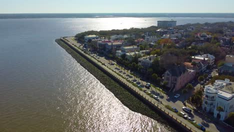 A-drone-shot-of-the-seawall-in-Charleston,-SC