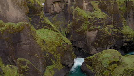 Aerial-view-of-Mogarfoss-waterfall-inside-Fjadrargljufur-canyon-in-Iceland