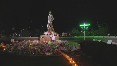 Spartan-Statue-on-the-campus-of-Michigan-State-University-at-night-after-the-mass-shooting-in-2023-with-video-panning-right-to-left