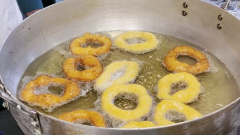 Picarones-a-traditional-Peruvian-dessert-being-cooked