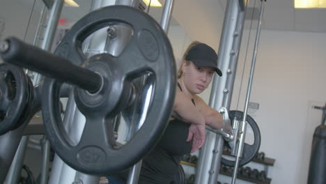 Wide-Pan-Right-Slowmo-of-a-Young-Woman-in-a-Gym