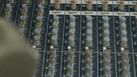 Close-up-of-a-professional-Audio-sound-mixer-in-a-recording-studio
