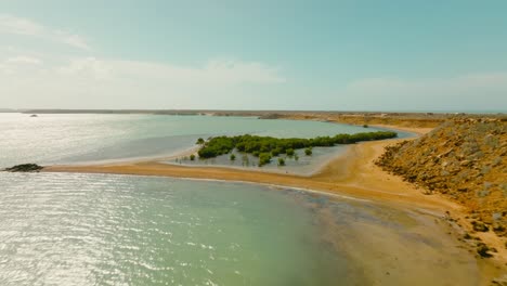 Aerial-view-flying-over-the-beach-in-the-desert,-Colombia,-la-guajira,-punta-gallinas