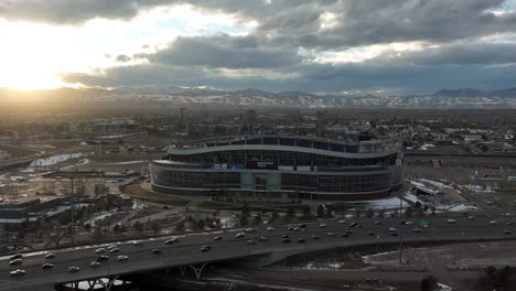 Sunset-aerial-view-of-Empower-Field-at-Mile-High-stadium,-Denver,-Colorado