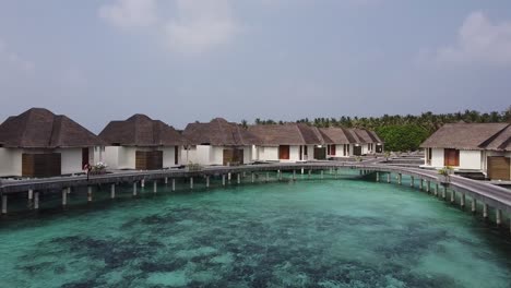 Aerial-view-of-water-houses,-from-a-resort-in-the-Maldives