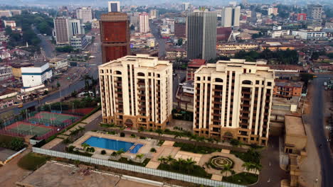 Static-aerial-view-of-modern-apartments,-golden-hour-in-Yaounde,-Cameroon,-Africa