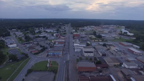 Small-southern-town-downtown-4k-drone-fly-over-main-street-during-sunset