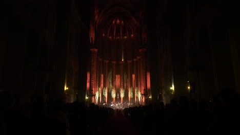 Majestic-glowing-scene-of-Santa-Maria-Del-Mar-in-Barcelona-during-concert,-dolly-forward