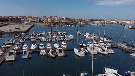 Sailboats-and-Yachts-in-Marina-Boat-Harbour-in-Peniche,-Portugal---Aerial