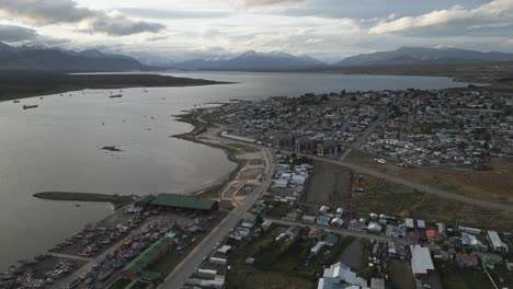 Pacific-Waters-of-Gulf-Montt,-Puerto-Natales-Chile,-Antarctic-Patagonia-Aerial-View,-Drone-Fly-Above-Sailing-Port,-and-City-Buildings