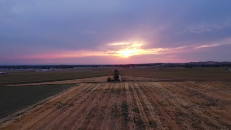 Drone-Reverse-Movement-Perspective-Over-Wheat-Field-During-Sunset-1080p-120-fps