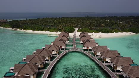 Tropical-island-resort-in-the-Indian-ocean-with-it's-wooden-bungalows
