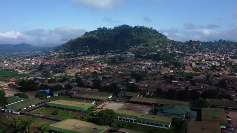 Aerial-view-of-a-hill,-buildings-and-poor-houses-in-the-city-of-Yaounde,-Cameroon