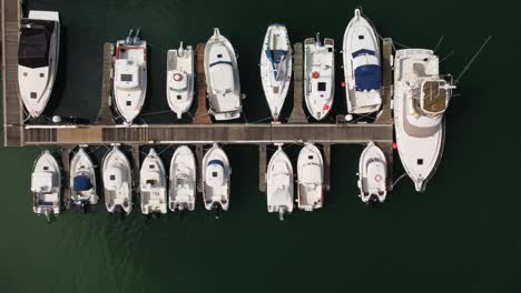 Boats-and-Yachts-Docked-at-Harbor-in-Peniche,-Portugal---Aerial-Top-Down-View
