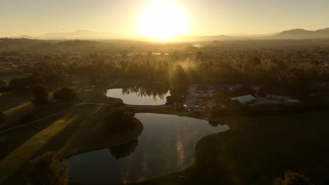 Drone-shot-sunrise-on-golf-course