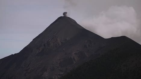 Camera-pan-zoomed-in-on-a-erupting-volcano-in-Guatemala