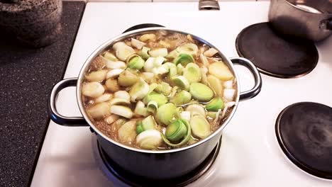 Hot-and-tasty-soup-simmering-on-the-stove---Cooking-Pork-Cabbage-Soup