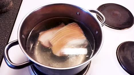 Boiling-delicious-pork-for-use-in-soup---Cooking-Pork-Cabbage-Soup