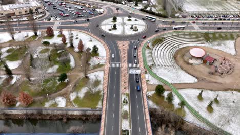 Roundabout-covered-in-snow-in-Spain,-aerial-view