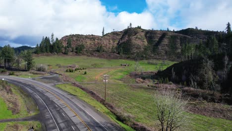 Beautiful-4K-aerial-drone-shot-overlooking-freeway-and-landscape-in-Southern-Oregon