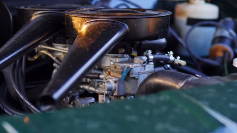 Opel-Oympia-classic-car-engine-bay-parallax-shot-on-a-slider-during-sunset,-50-fps-slow-motion