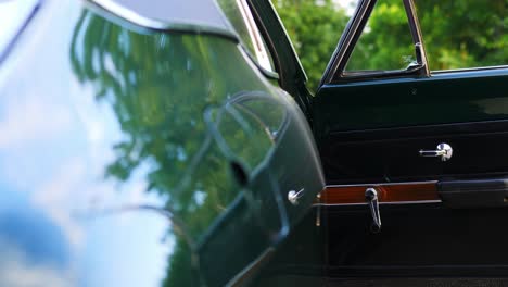 Opel-Olympia-classic-car-shot-from-back,-opened-door-slider-shot-to-the-side,-50-fps-slow-motion