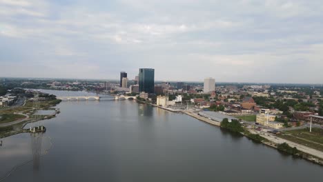 Downtown-Toledo,-Ohio-on-the-Maumee-River,-aerial-fly-toward-view