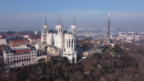 Aerial-view-of-Notre-Dame-de-Fourviere-basilica-on-hilltop-of-Lyon-French-city-at-day-time