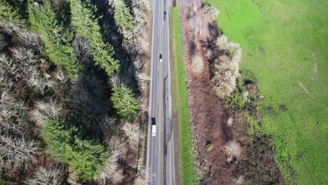 Beautiful-4K-aerial-drone-shot-overlooking-freeway-and-creek-bedding-in-Southern-Oregon