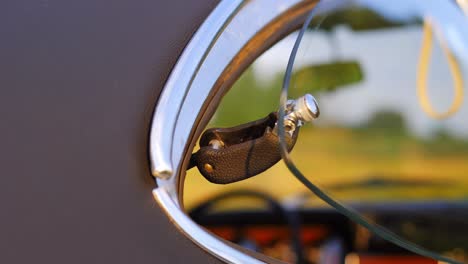 Opel-Olympia-classic-car-rear-window-opened-during-sunset,-50-fps-slow-motion