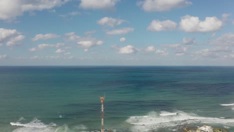 4k-Aerial---Ocean-waves-calmly-splashing-on-coastline---North-Israel
