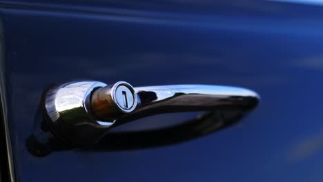 Opel-Olympia-classic-car-door-handle-shot,-50-fps-slow-motion