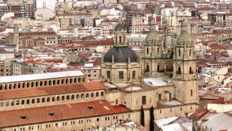 The-gothic-cathedral-of-Salamanca,-aerial-drone-view-in-a-winter-day