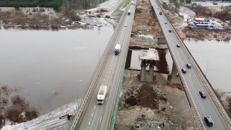 Remains-of-demolished-A1-highway-bridge-in-Kaunas,-Lithuania,-aerial-view