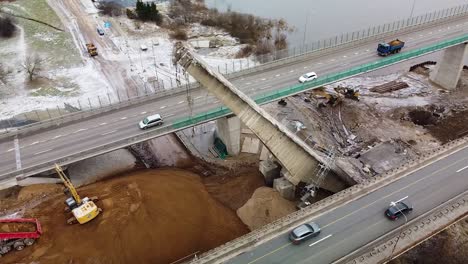 Collapsed-bridge-of-Kaunas-city-on-A1-highway,-aerial-orbit-view